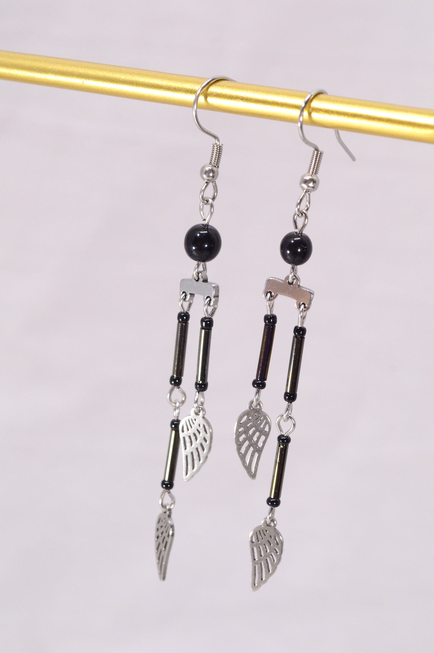 Feather Charm Drop Earrings, Lightweight dangle earrings, Modern chic drop earrings, Estibela design. 8cm - 3.1"