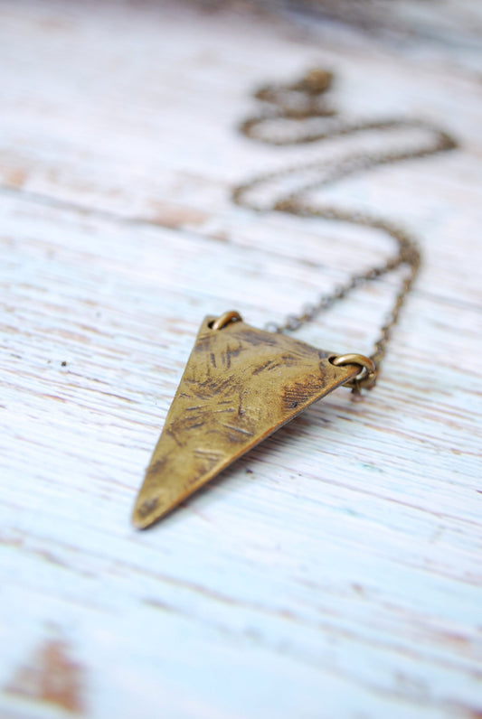 Geometric texture triangle pendant, boho bronze necklace, estibela design, simple everyday outfit.