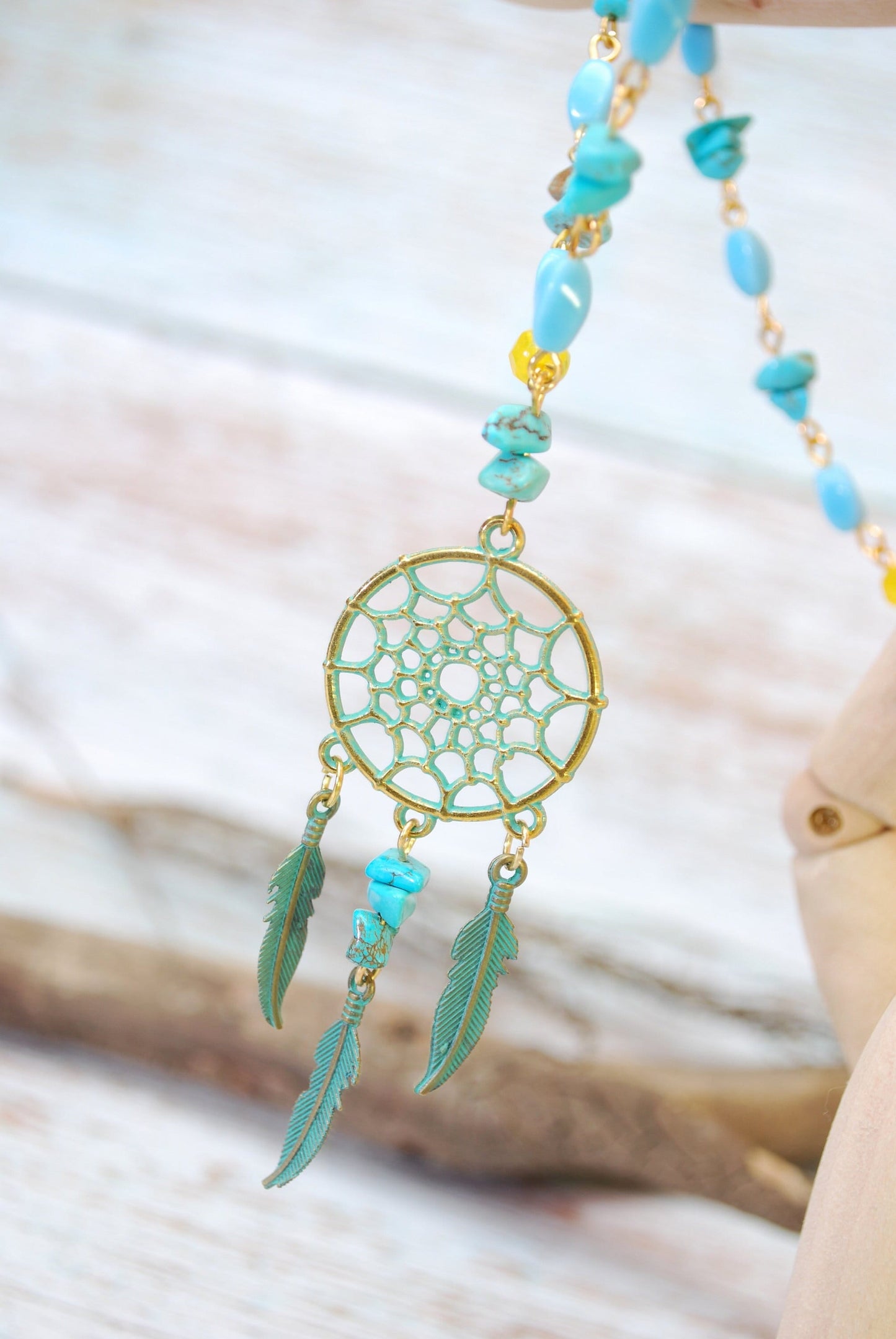 Spiritual Native American-Inspired Gold Pendant Necklace featuring Turquoise Quartz Stone and Beaded Feathers.  Estibeela design. 20"