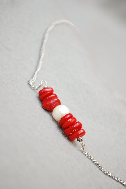 Ocean Breeze: Stainless Steel Necklace with Freshwater Pearl Center and Coral Stones. Estibela design.