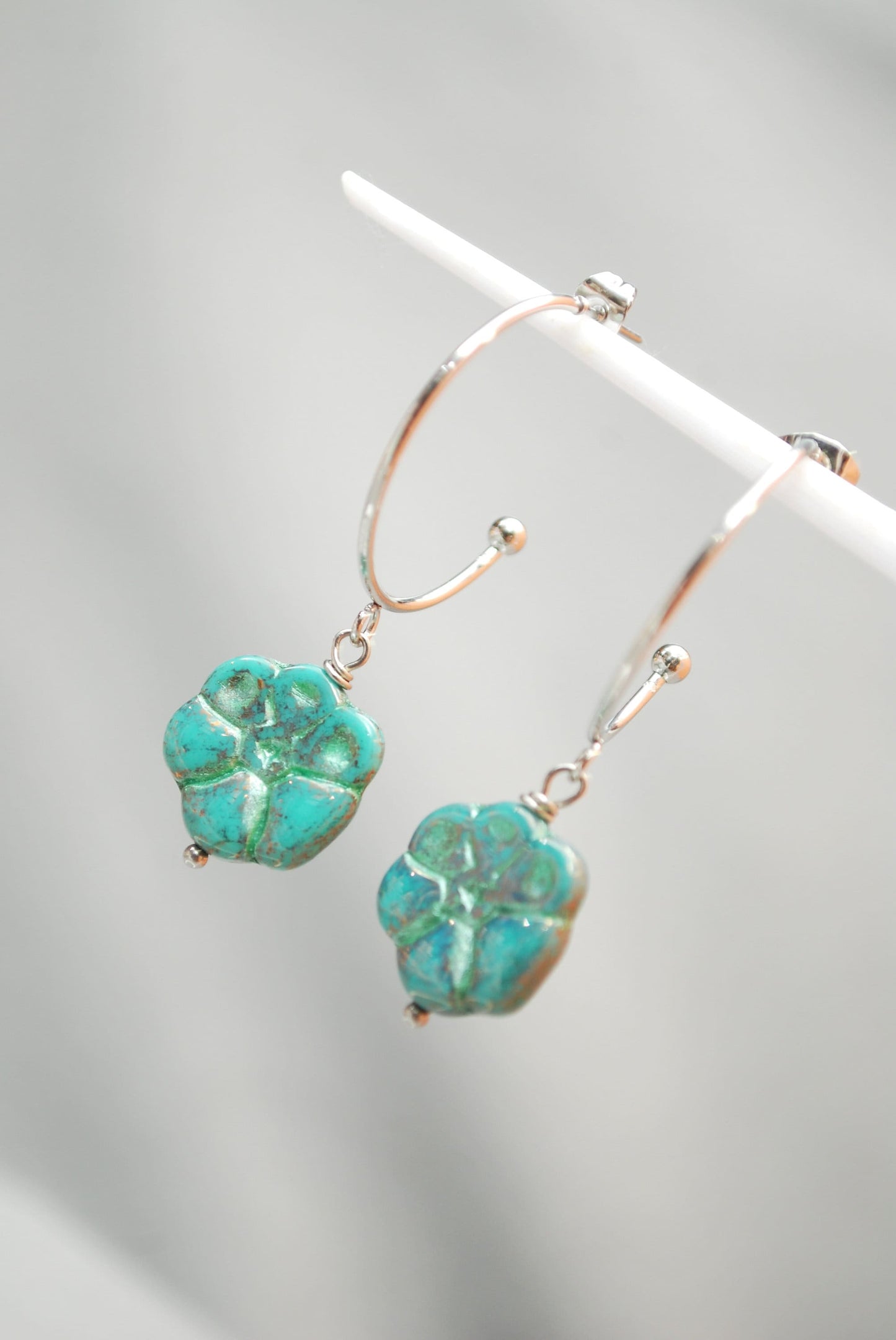 Elegant floral bead earrings. Boho-inspired round stud earrings. Estibela design. 5cm - 2". Chic stainless steel earrings for beachwear.