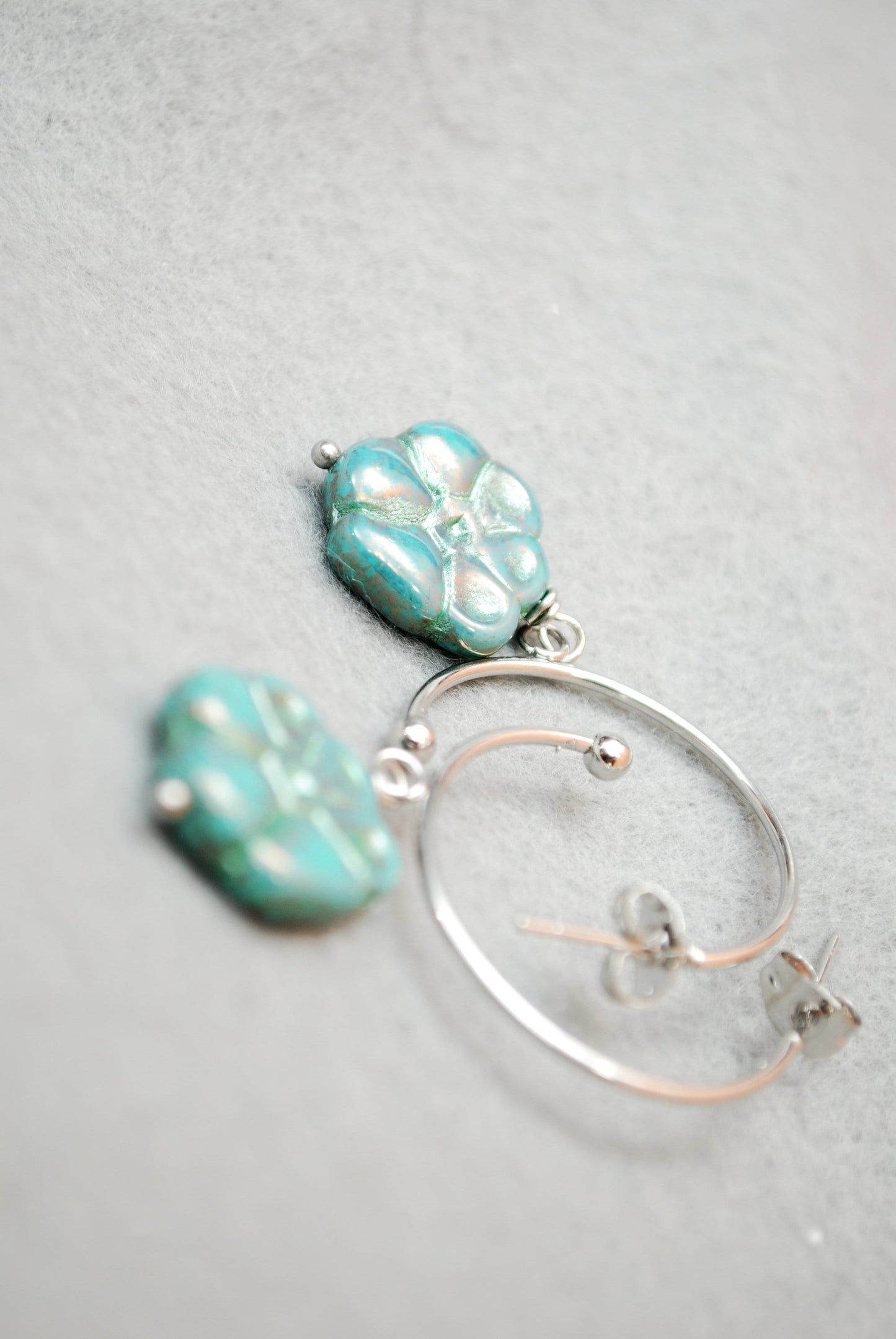 Elegant floral bead earrings. Boho-inspired round stud earrings. Estibela design. 5cm - 2". Chic stainless steel earrings for beachwear.
