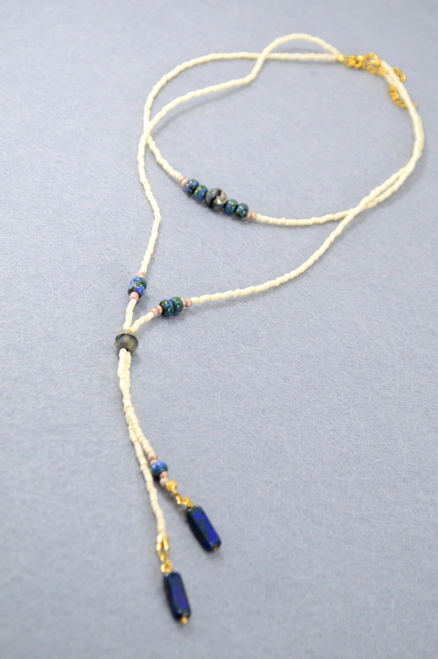 Cream Beaded Lariat Necklace with Sapphire Blue Glass Beads – Adjustable Y Necklace