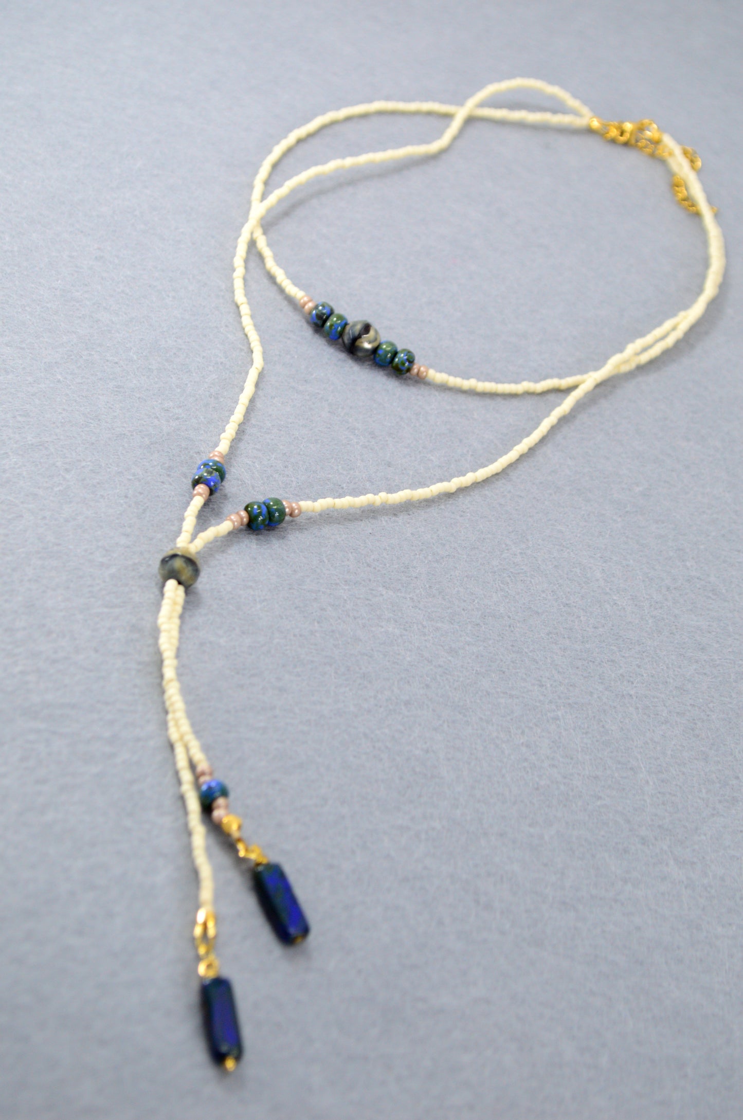 Cream Beaded Lariat Necklace with Sapphire Blue Glass Beads – Adjustable Y Necklace