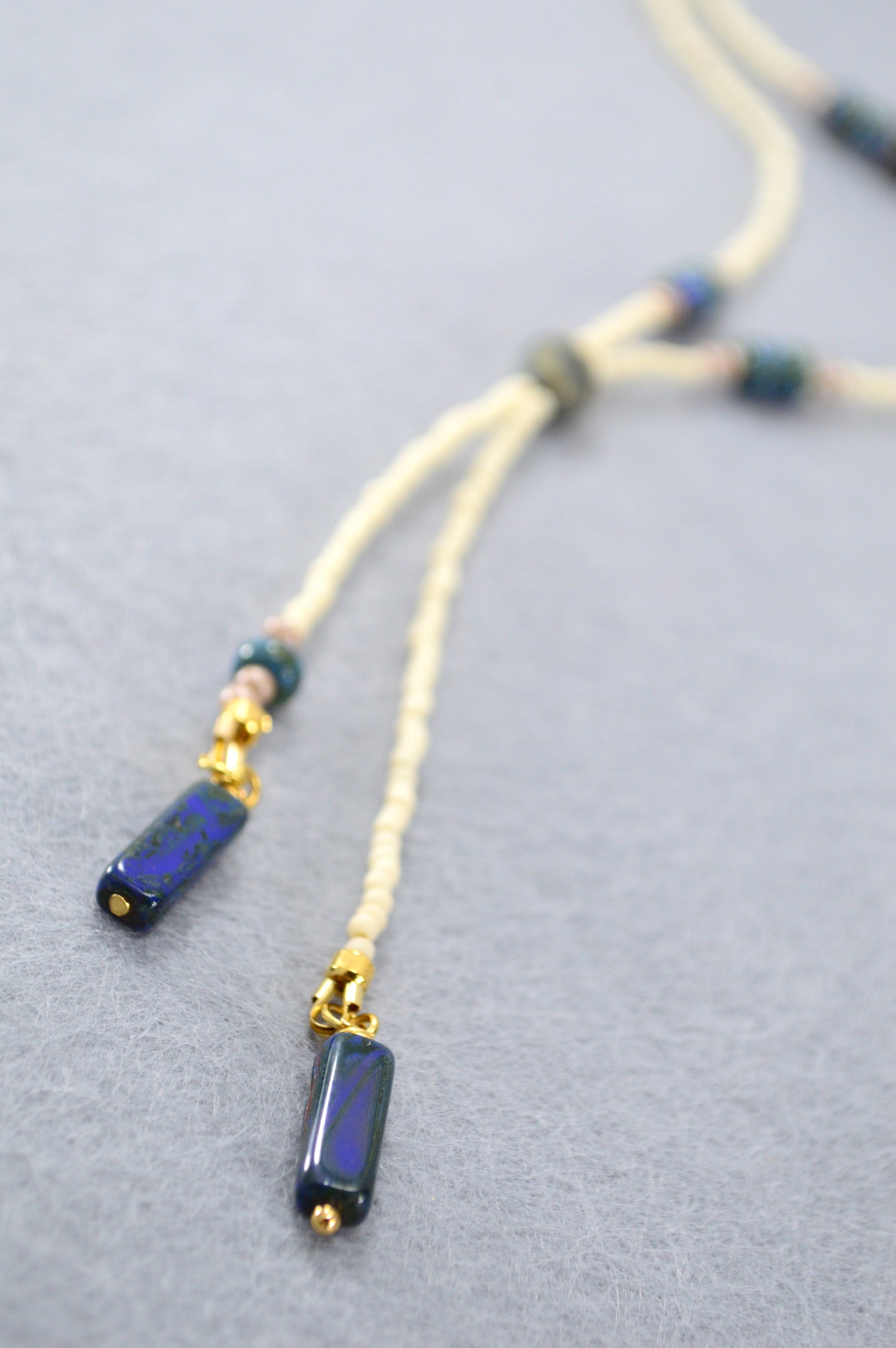 Cream Beaded Lariat Necklace with Sapphire Blue Glass Beads – Adjustable Y Necklace