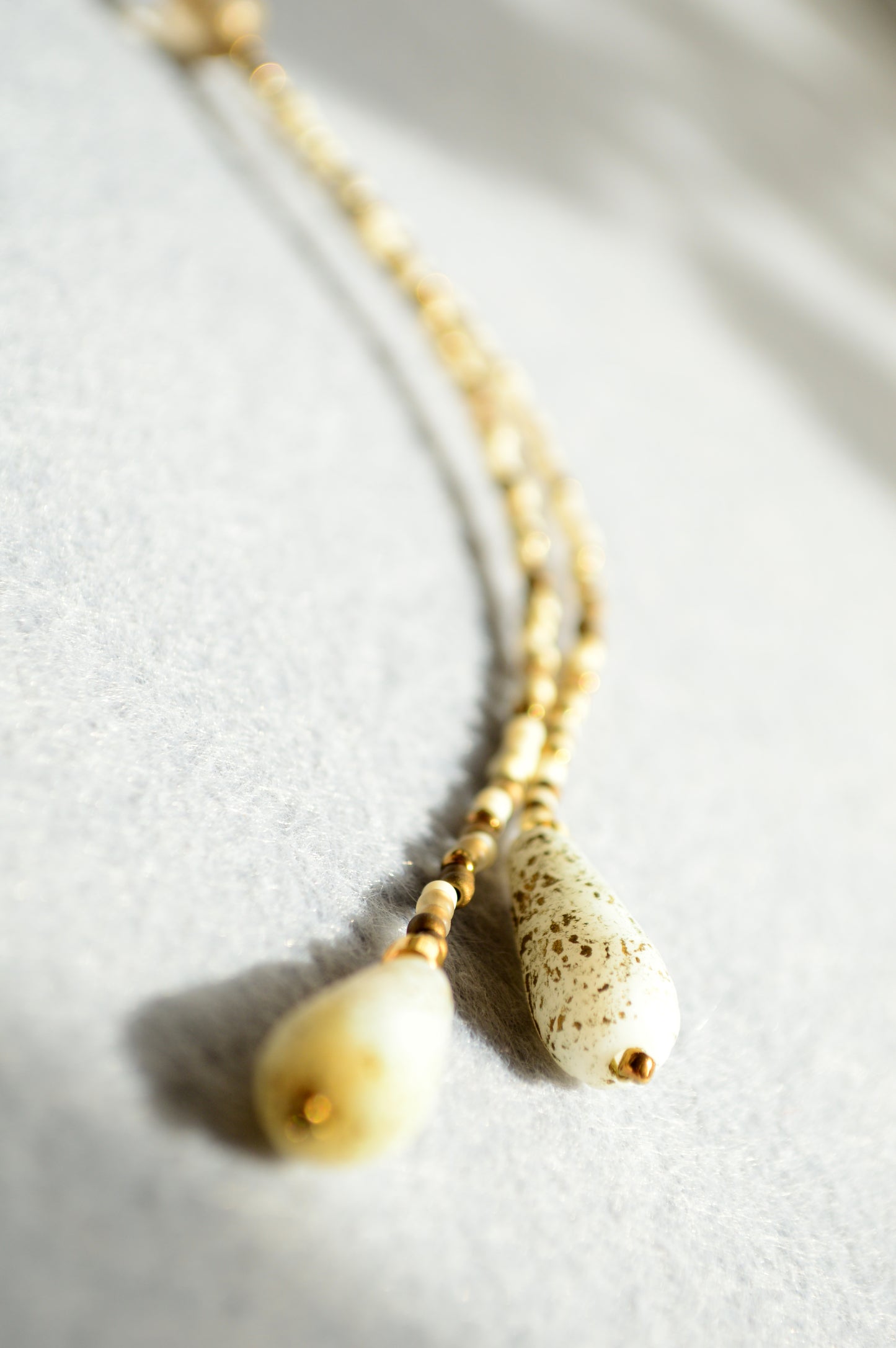 Gold Lariat Necklace with White Marble Glass Drops – Adjustable Y Necklace
