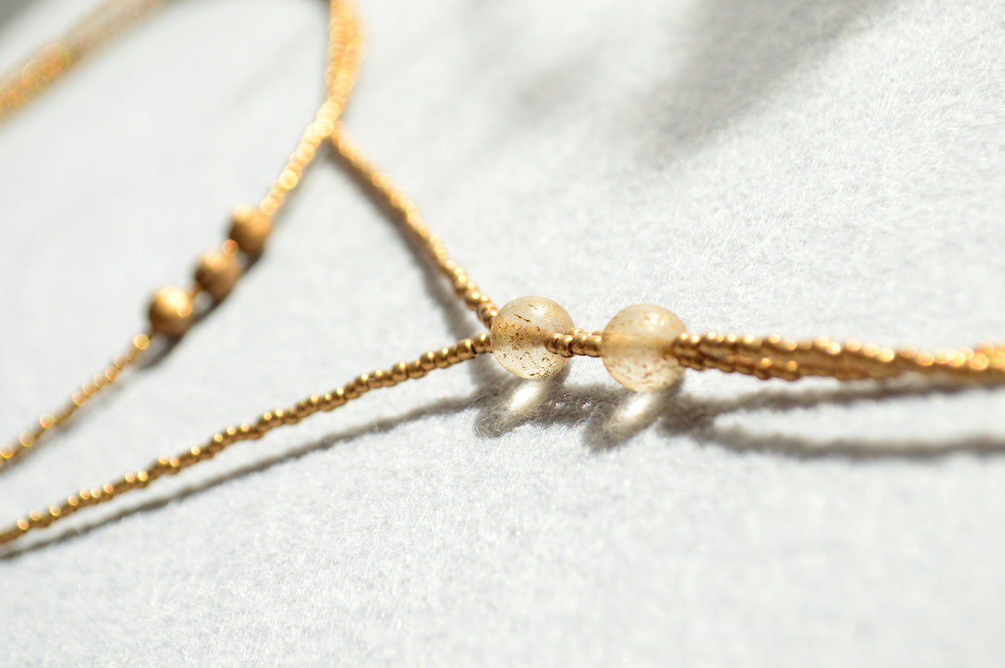 Gold Beaded Lariat Necklace with White Marble Glass Drops – Adjustable Minimalist Y Necklace