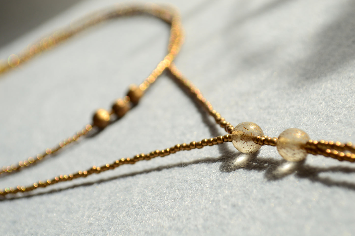 Gold Beaded Lariat Necklace with White Marble Glass Drops – Adjustable Minimalist Y Necklace