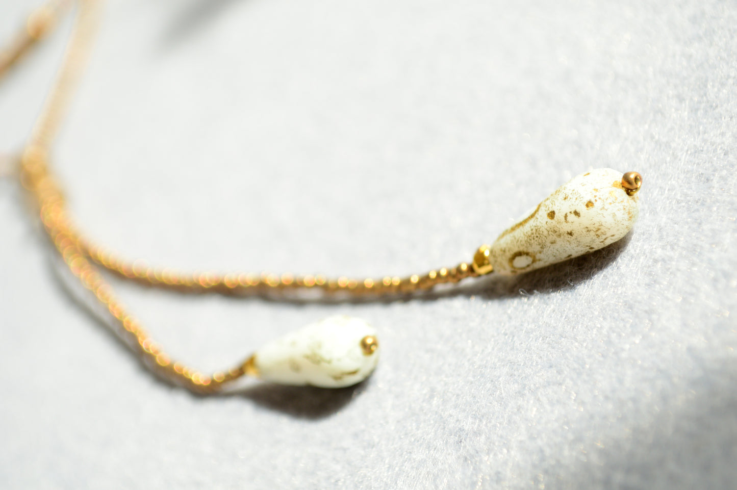 Gold Beaded Lariat Necklace with White Marble Glass Drops – Adjustable Minimalist Y Necklace