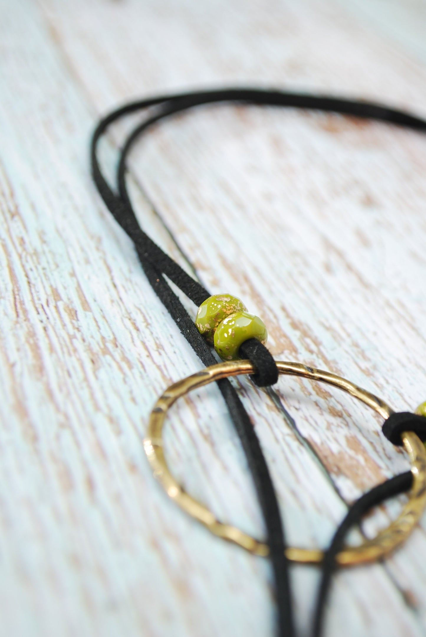 Trendy leather choker, black and bronze extra long spike necklace. Trendy bohemian jewelry.