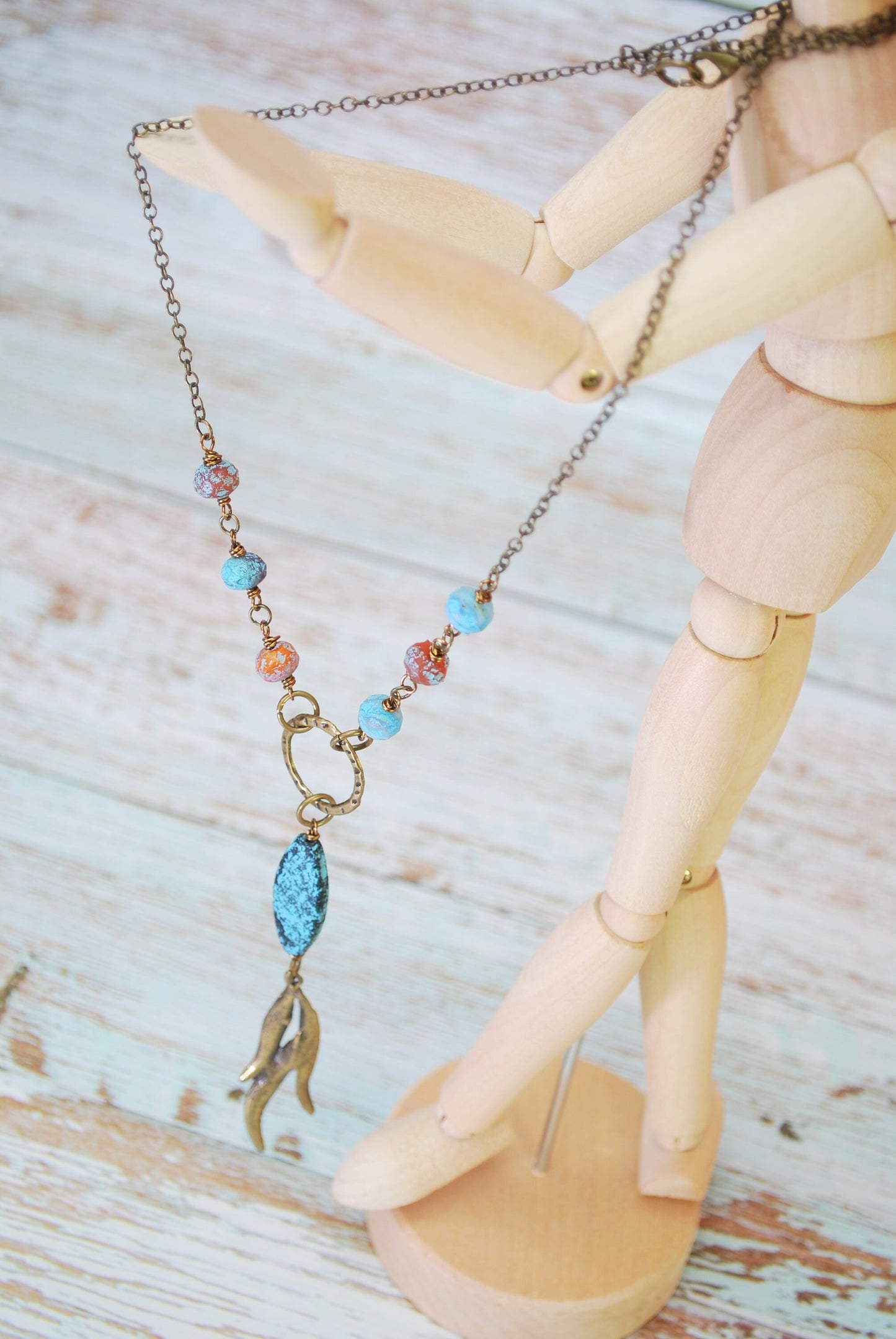 Boho Chic Bronze Leaf Pendant Necklace with Sea Glass Blue Beads