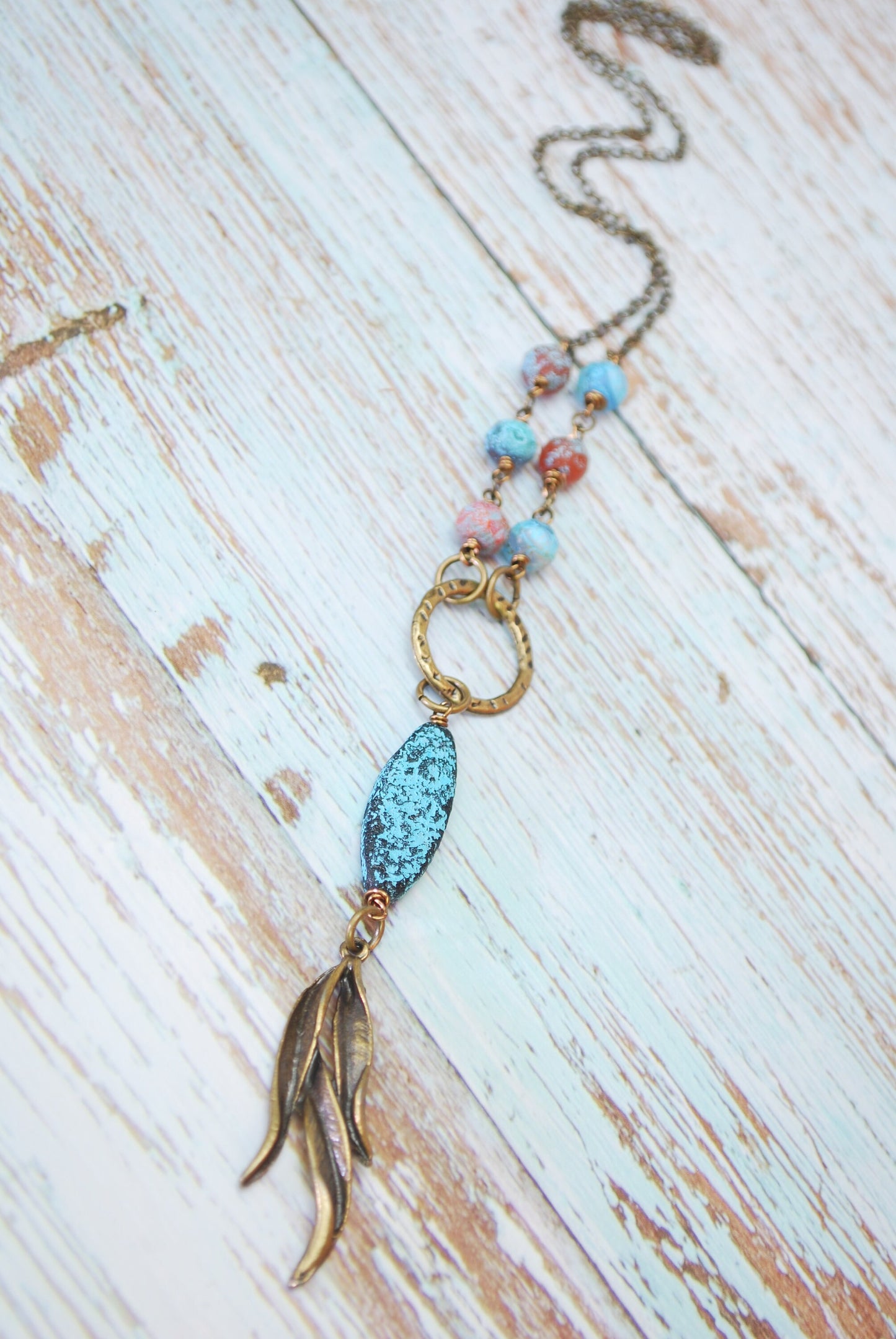 Boho Chic Bronze Leaf Pendant Necklace with Sea Glass Blue Beads