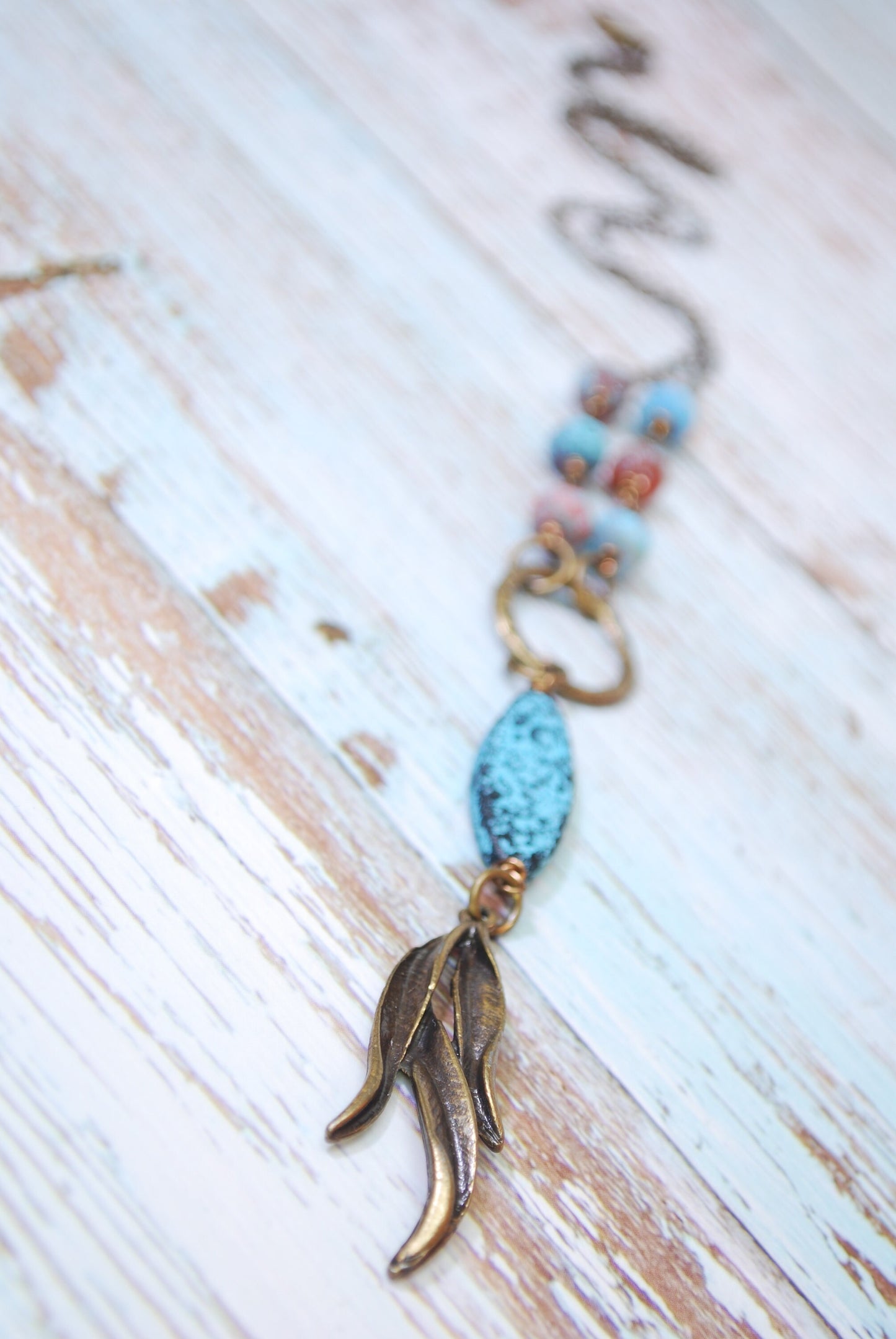 Boho Chic Bronze Leaf Pendant Necklace with Sea Glass Blue Beads