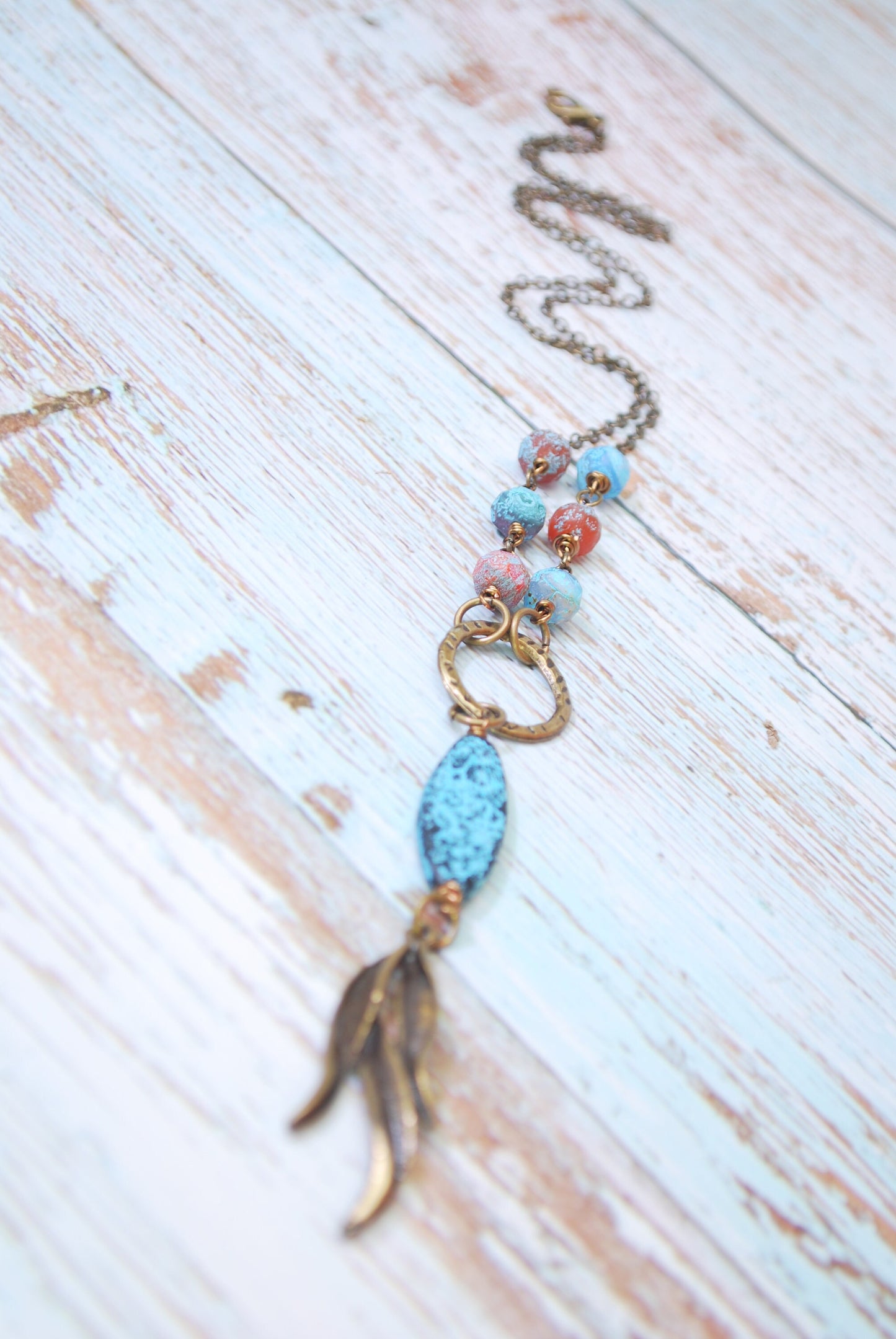 Boho Chic Bronze Leaf Pendant Necklace with Sea Glass Blue Beads