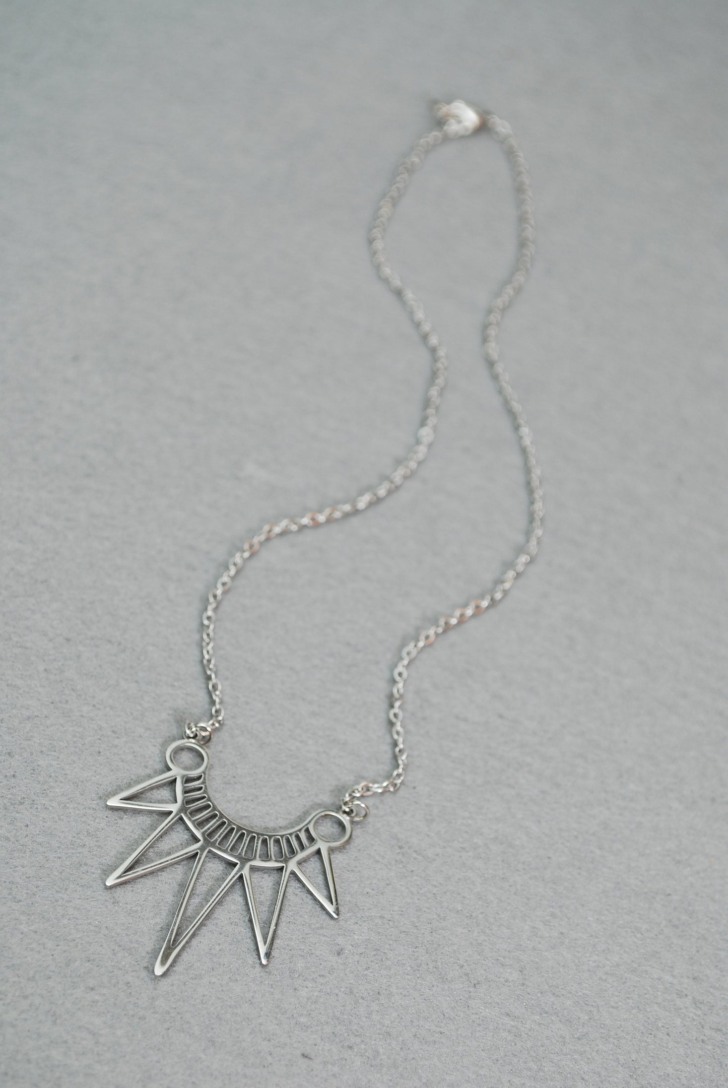 Egypt Style Necklace is a bohemian charm in stainless steel. Geometric design adds a splash of personality to any outfit