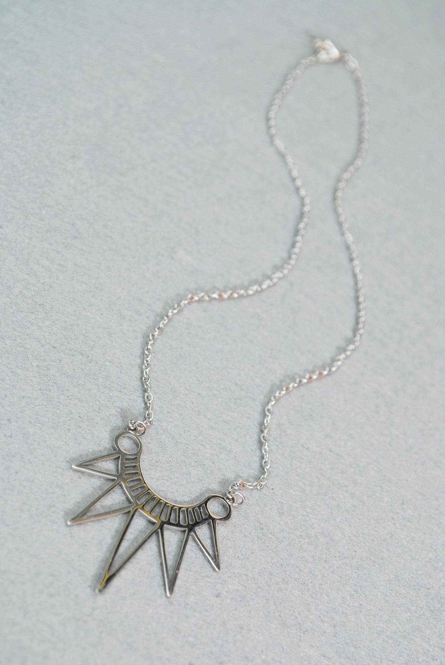 Egypt Style Necklace is a bohemian charm in stainless steel. Geometric design adds a splash of personality to any outfit