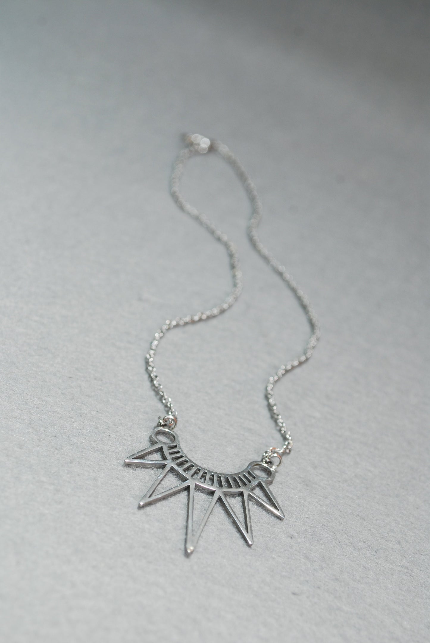 Egypt Style Necklace is a bohemian charm in stainless steel. Geometric design adds a splash of personality to any outfit