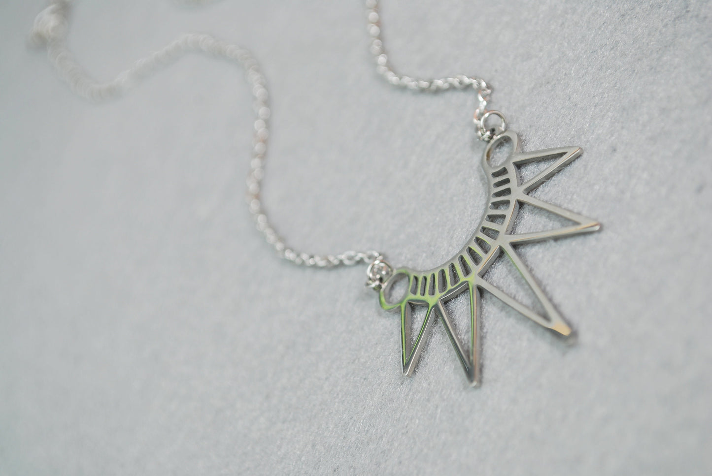 Egypt Style Necklace is a bohemian charm in stainless steel. Geometric design adds a splash of personality to any outfit