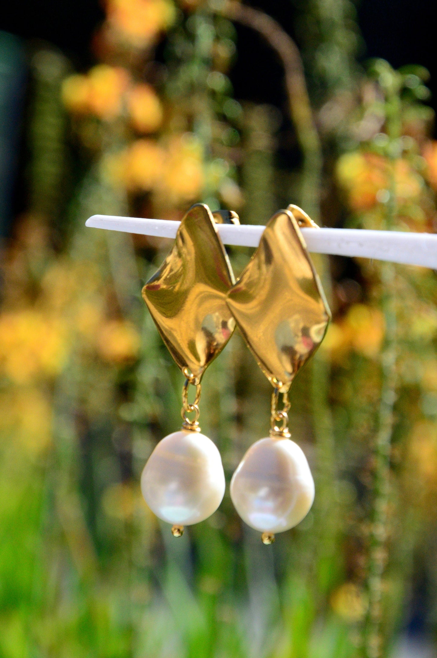 Chunky gold stainless steel earrings, Statement earrings with rhombus clasps", freshwater pearl earrings, Estibela design. 5cm - 2"