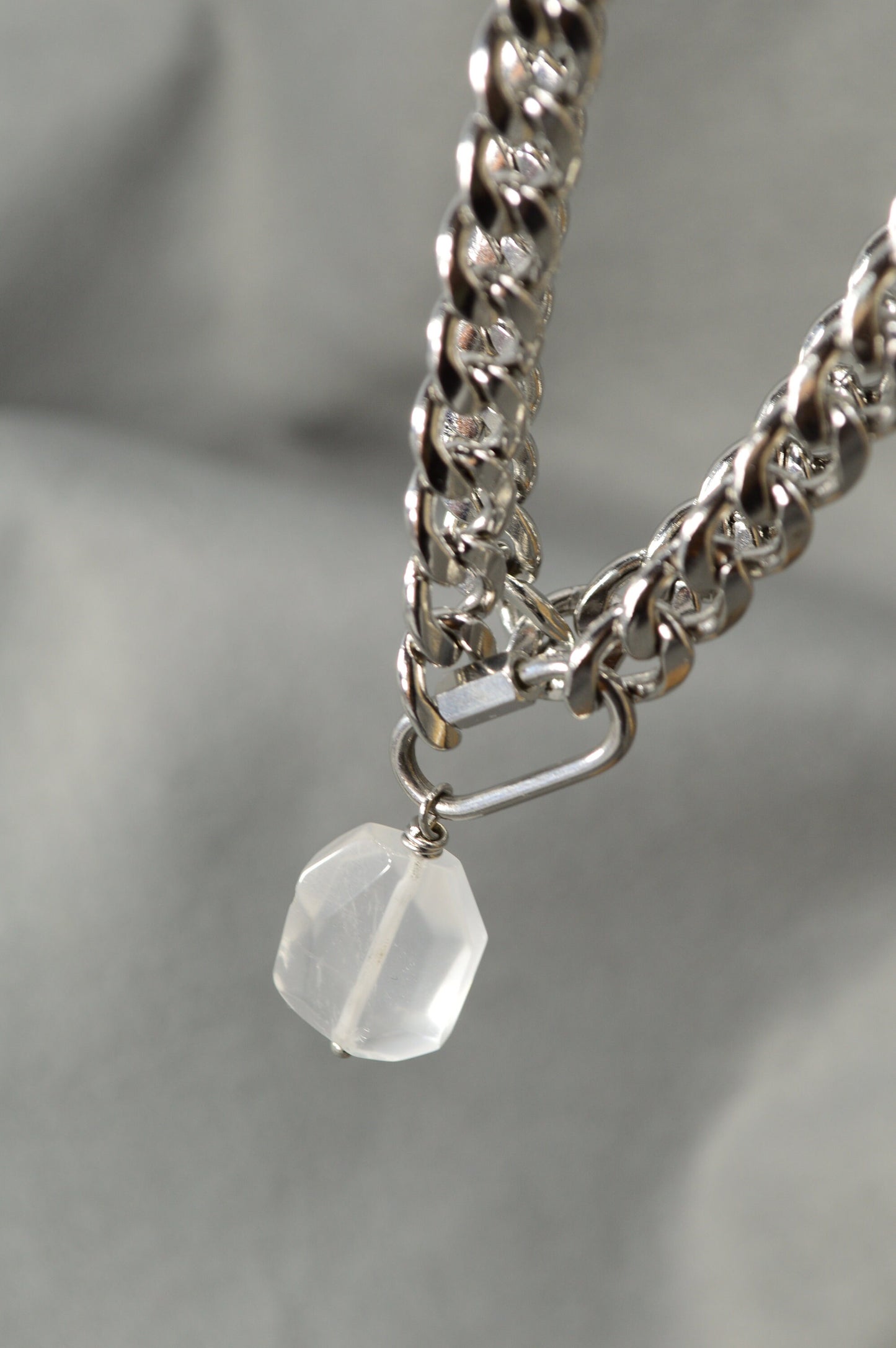 The Lavra Aesthetic: Bold Stainless Steel Chain with Intricate Clasp and Suspended Stone