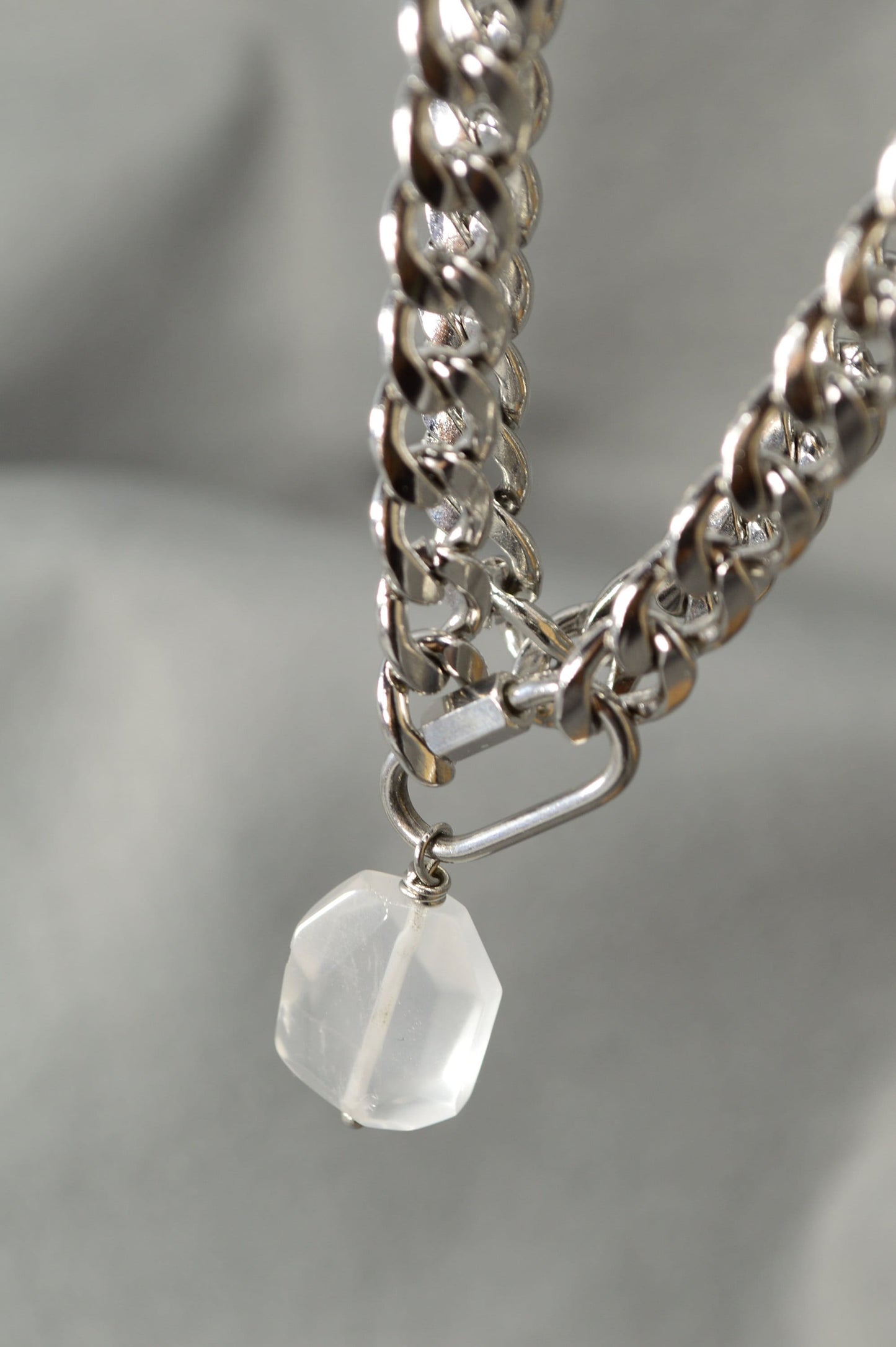 The Lavra Aesthetic: Bold Stainless Steel Chain with Intricate Clasp and Suspended Stone