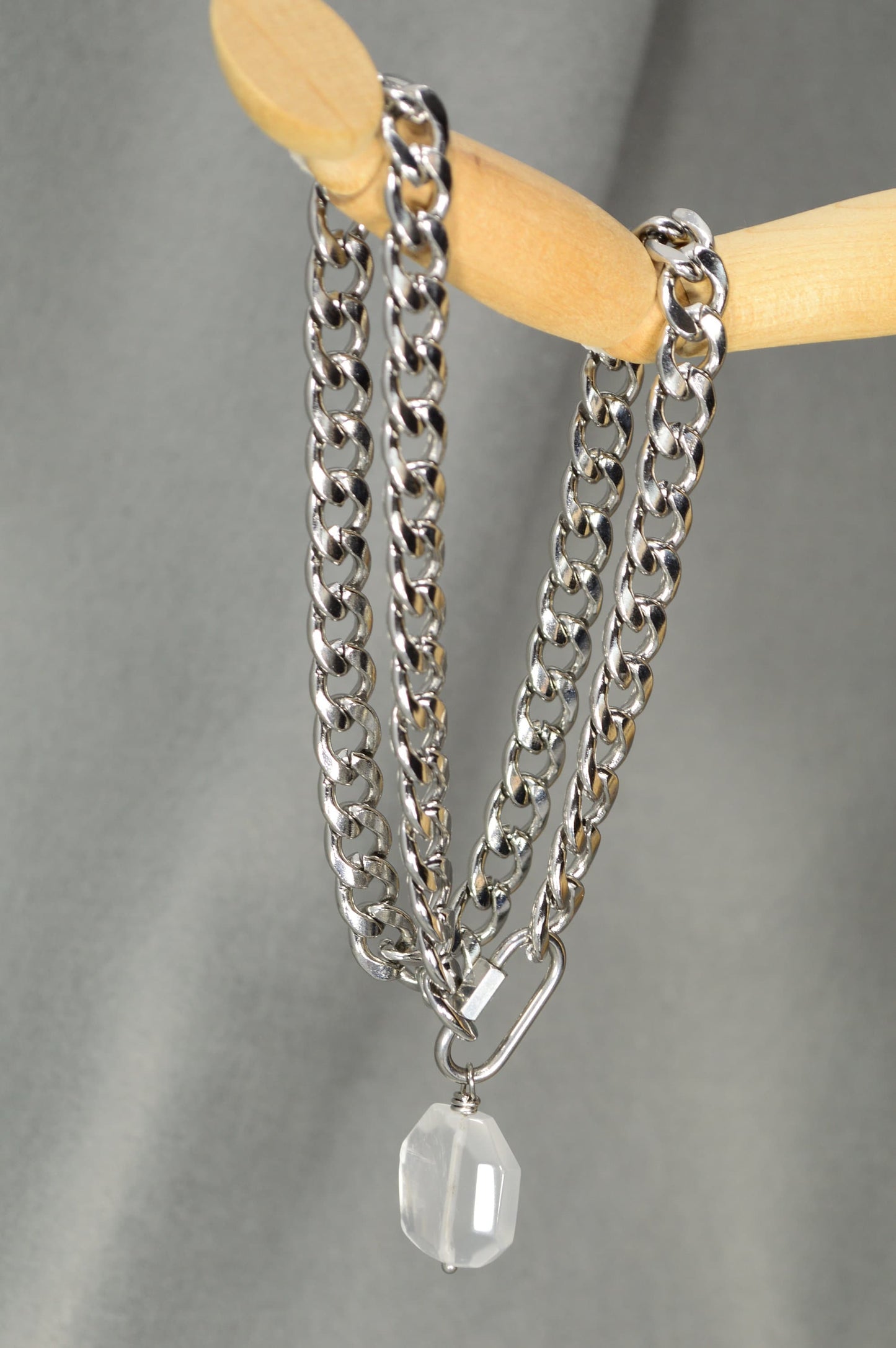 The Lavra Aesthetic: Bold Stainless Steel Chain with Intricate Clasp and Suspended Stone