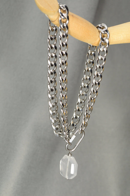 The Lavra Aesthetic: Bold Stainless Steel Chain with Intricate Clasp and Suspended Stone