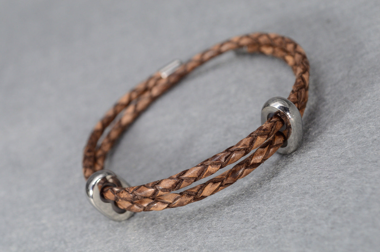 Handcrafted Braided Leather Bracelet with Stainless Steel Accents - Vintage Style. Adjustible length. Estibela