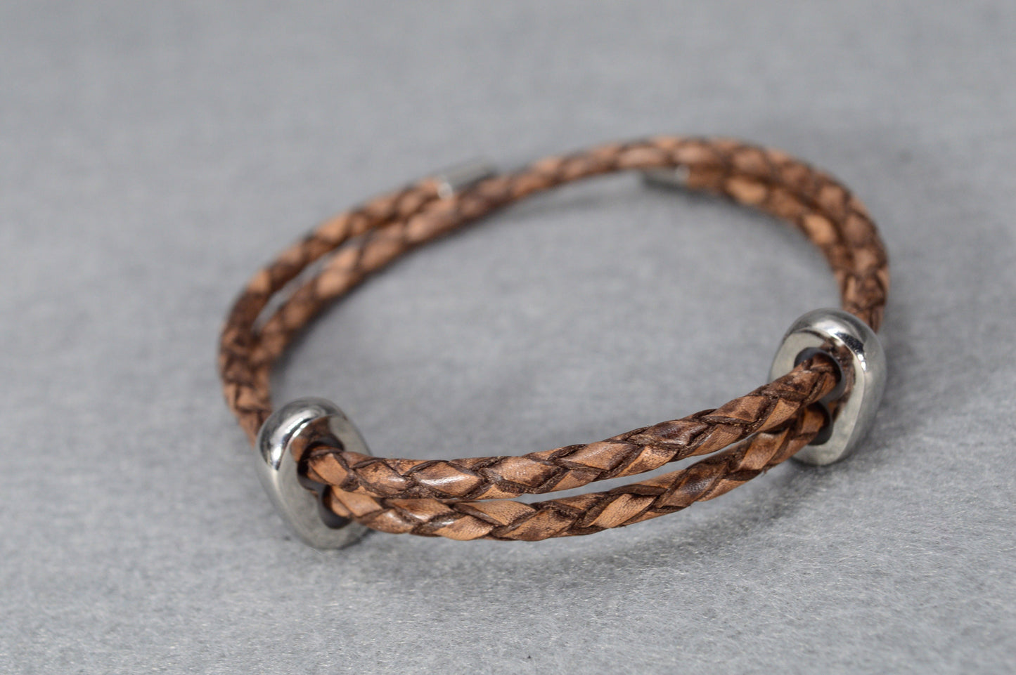 Handcrafted Braided Leather Bracelet with Stainless Steel Accents - Vintage Style. Adjustible length. Estibela