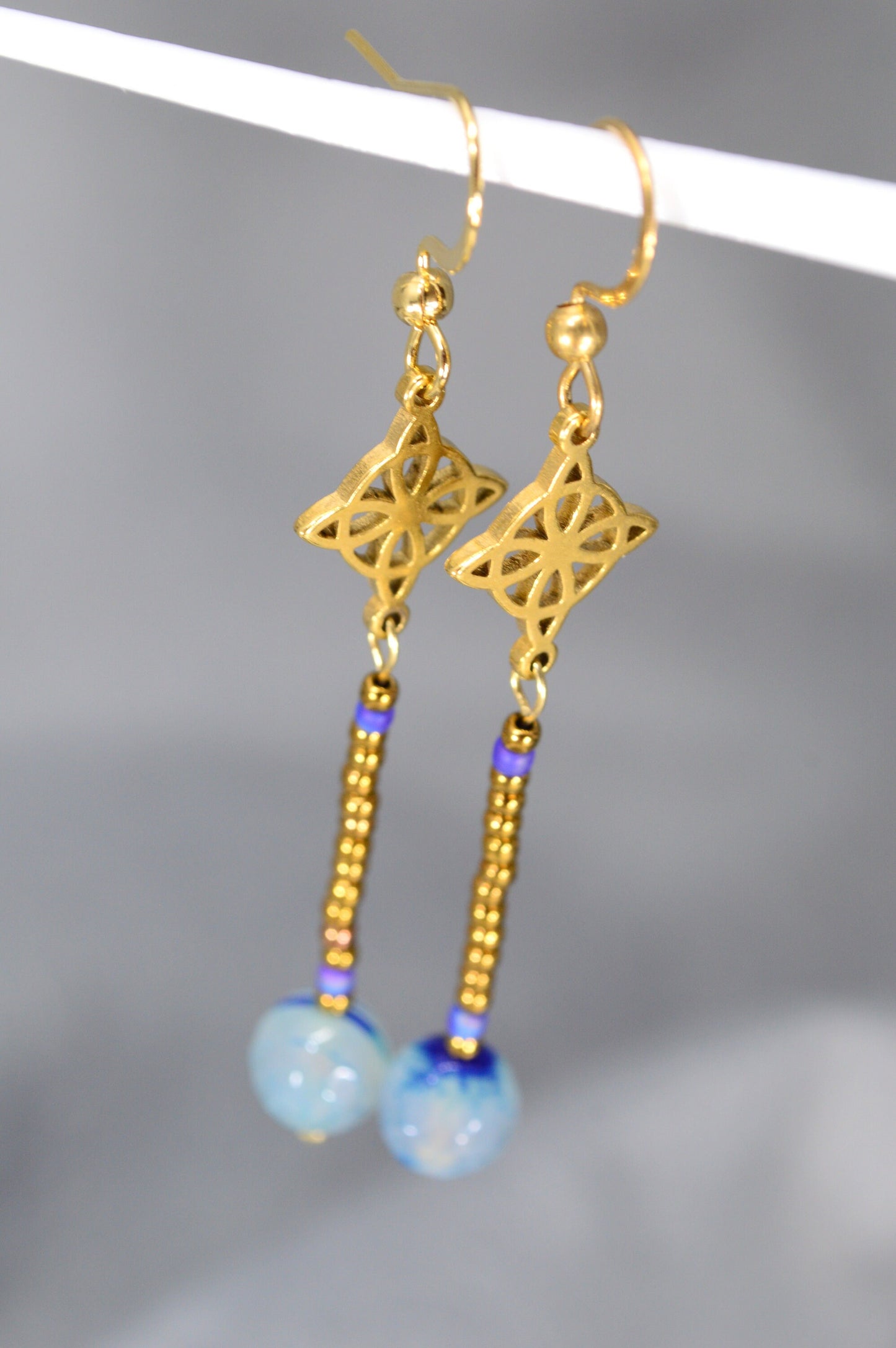 Handcrafted Elegance: Estibela Design Stainless Steel Earrings with Celtic Knot and Blue Agate. 6cm - 2.4"