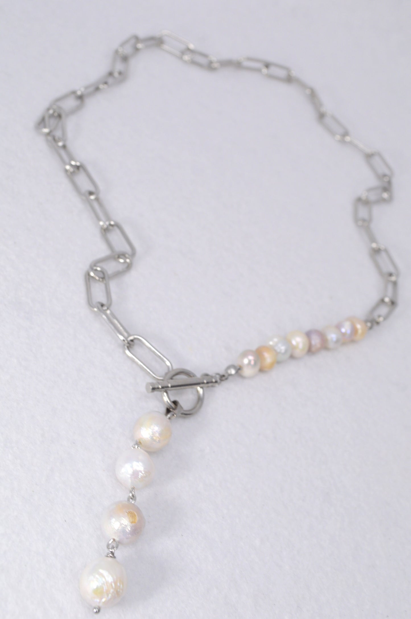 Baroque Pearls Boho Necklace. Ethereal Radiance: Boho Pearl Cascade Necklace in Stainless Steel.