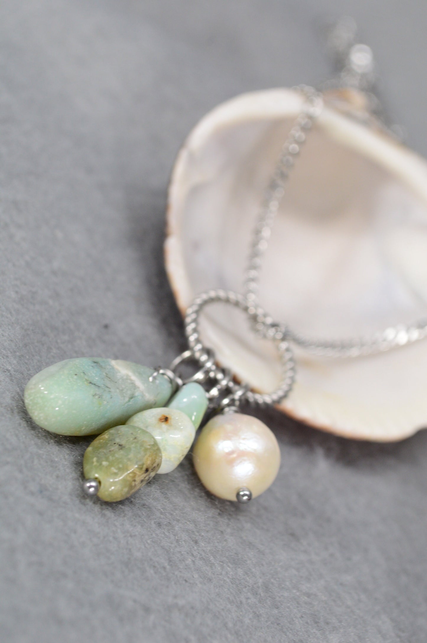 Artisan-crafted pendant featuring amazonite,  baroque pearl – versatile accessory blending boho, ethnic, and vintage look.