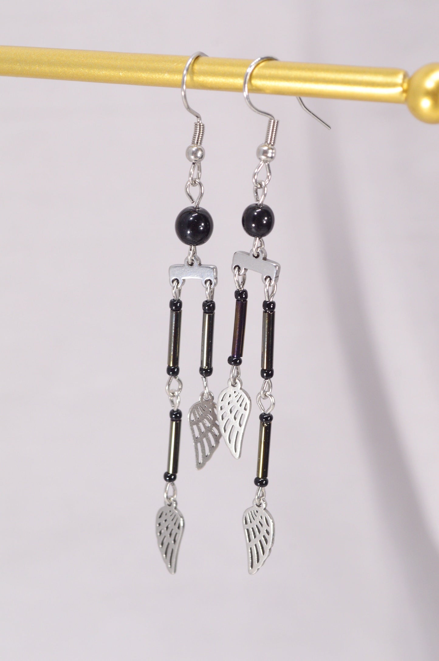 Feather Charm Drop Earrings, Lightweight dangle earrings, Modern chic drop earrings, Estibela design. 8cm - 3.1"