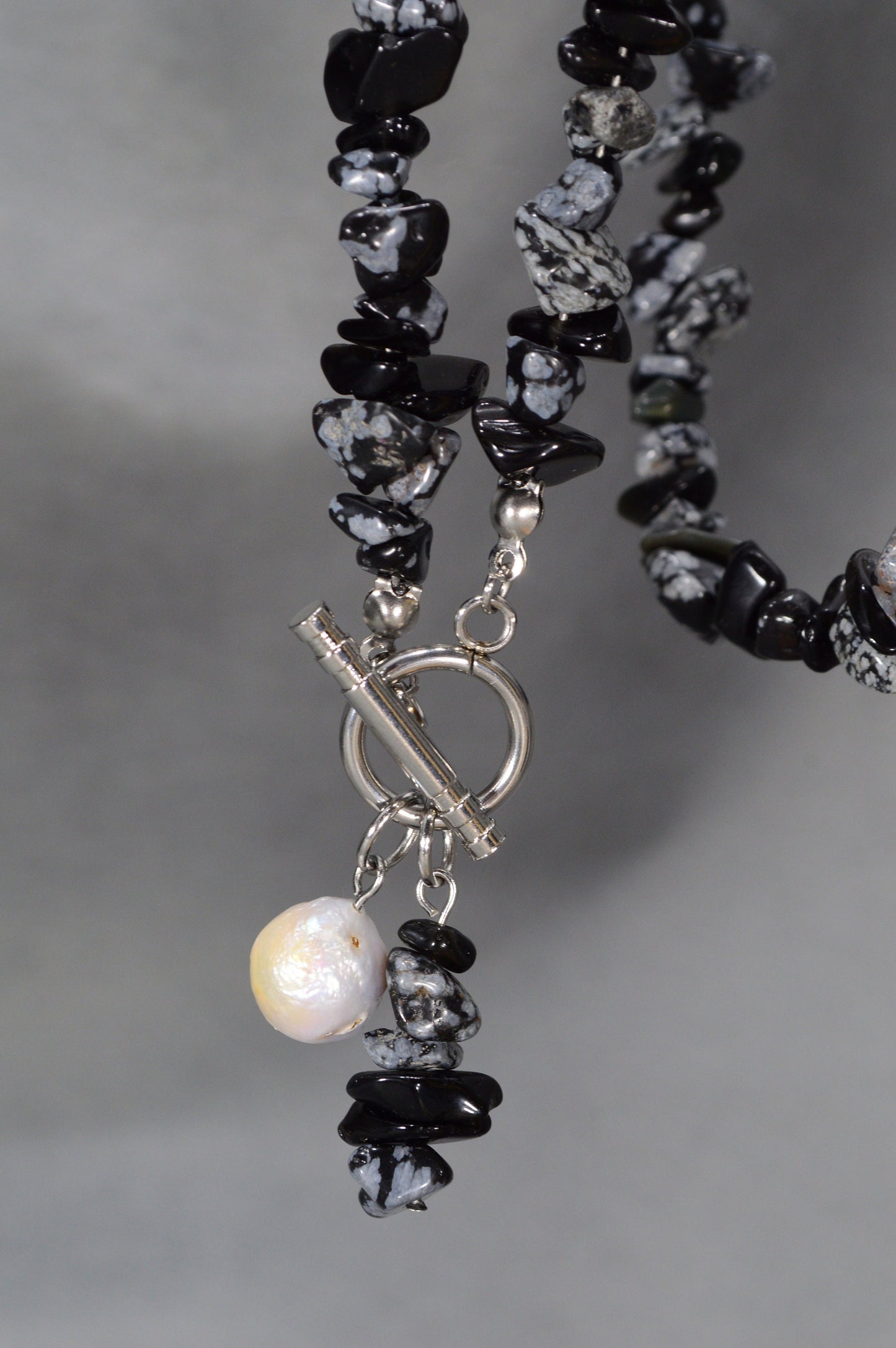 Handcrafted necklace with unique jasper stones and a baroque pearl, blending bohemian charm with contemporary design. Estibela design