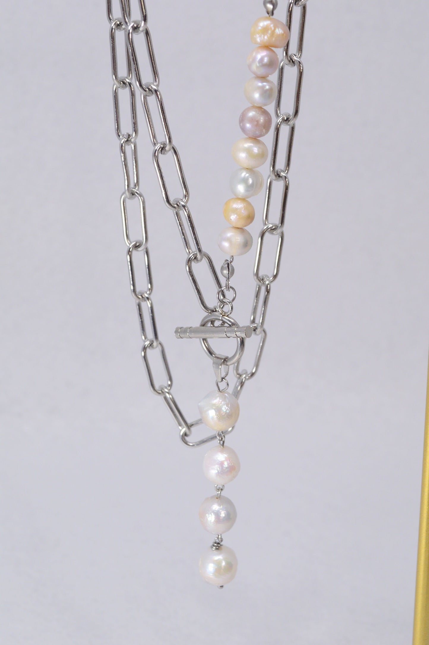 Baroque Pearls Boho Necklace. Ethereal Radiance: Boho Pearl Cascade Necklace in Stainless Steel.