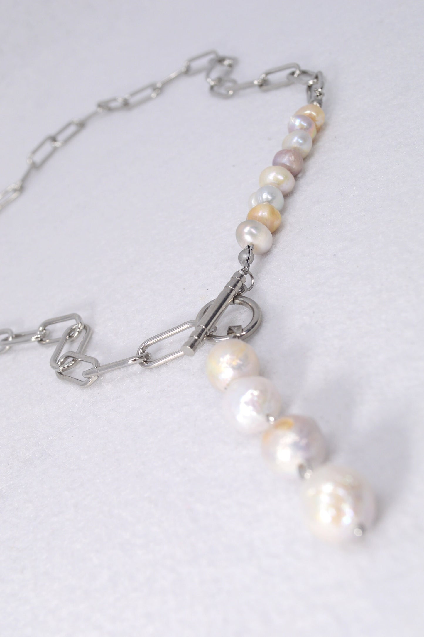 Baroque Pearls Boho Necklace. Ethereal Radiance: Boho Pearl Cascade Necklace in Stainless Steel.