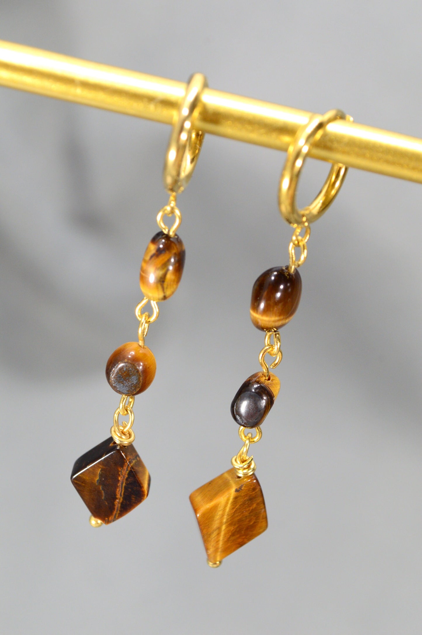 Tiger's Eye Bead Earrings with Stainless Steel Hooks, Featuring Cascading Irregular Shapes and Rhombus Design. Estibela. 6cm - 2.2"