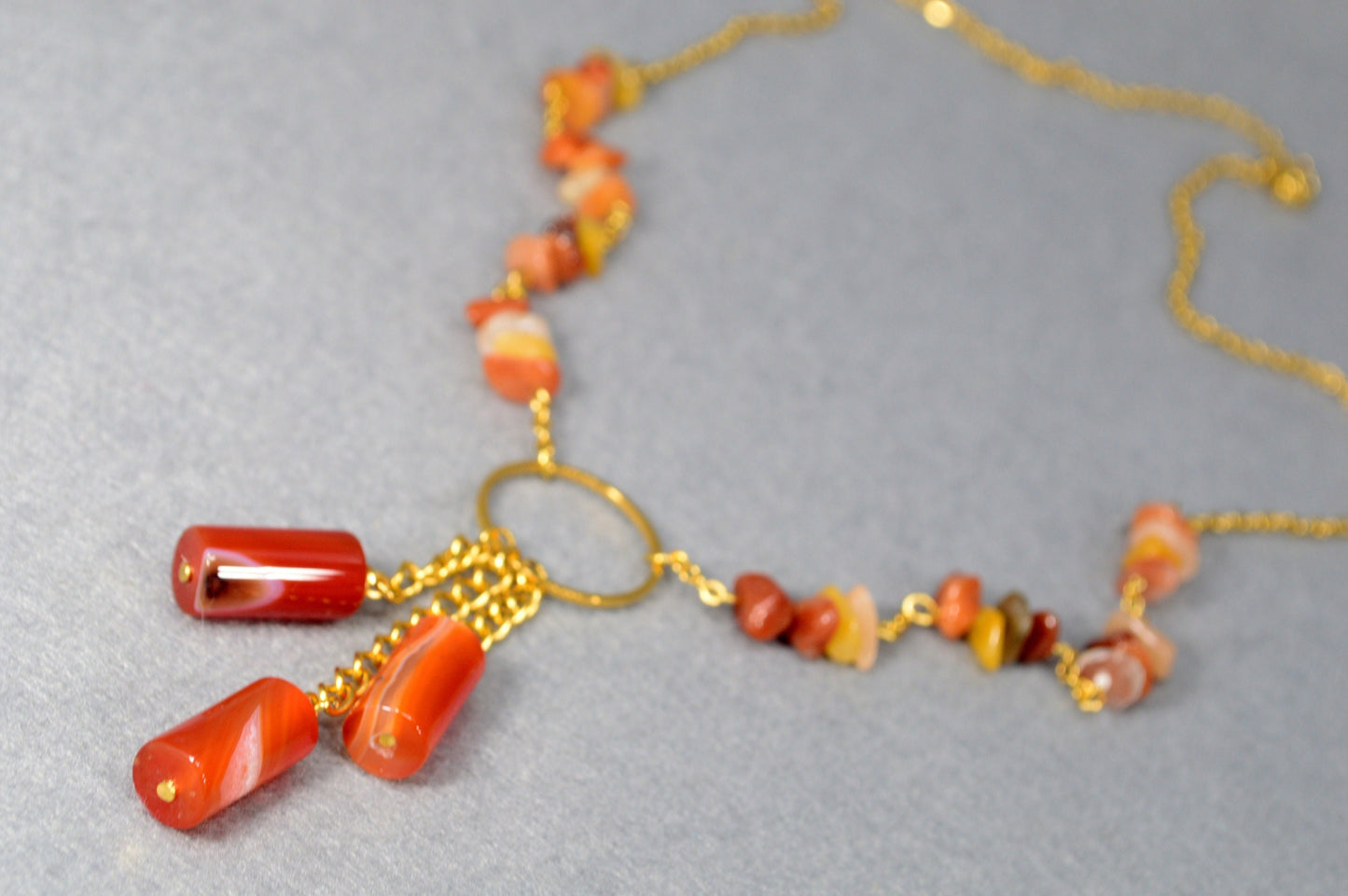 Sophisticated golden necklace adorned with agate stone beads. Unique Estibela collection. Agate bead chain accessory. Evening wear.