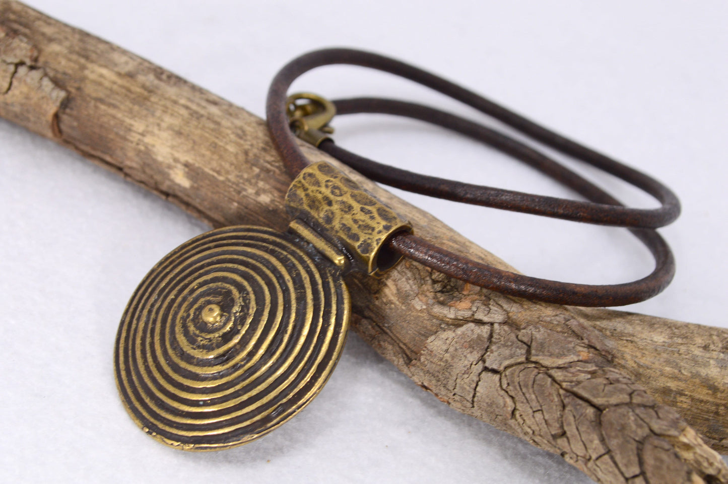 Last 2 in stock - Boho tribal leather necklace. Big Bronze Circle Pendant: Versatile Elegance with Leather Craft Detailing for Autumn Gifts.