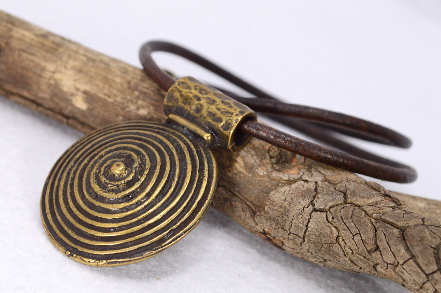 Last 2 in stock - Boho tribal leather necklace. Big Bronze Circle Pendant: Versatile Elegance with Leather Craft Detailing for Autumn Gifts.